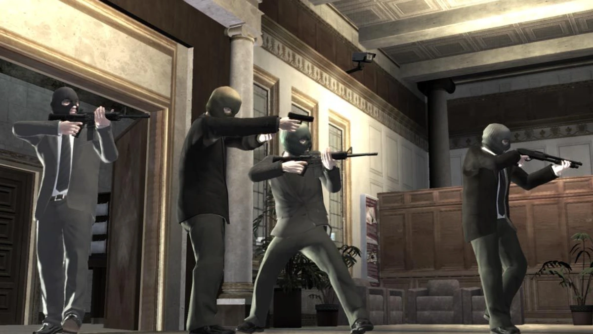 Cuatro atracadores enmascarados apuntan con armas en el vestíbulo de un banco en GTA IV
