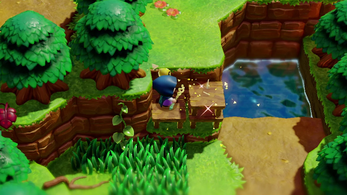 Zelda con el Tri Rod creando el eco de una mesa junto a un estanque