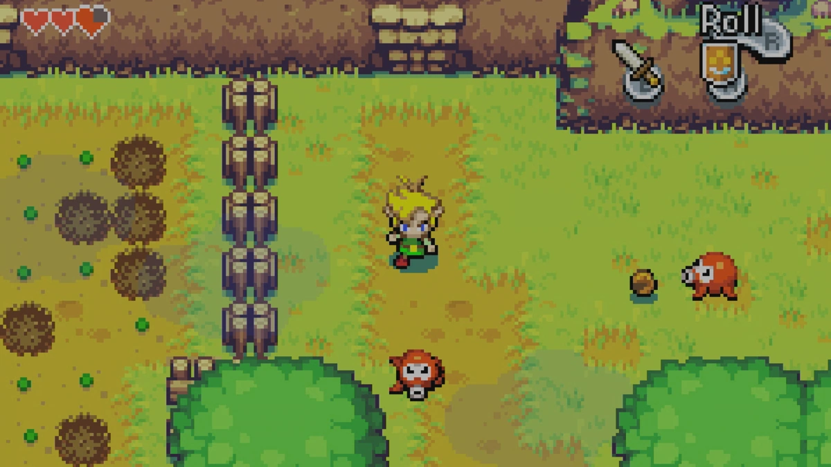 Link en un camino de tierra frente a dos Octoroks en The Minish Cap