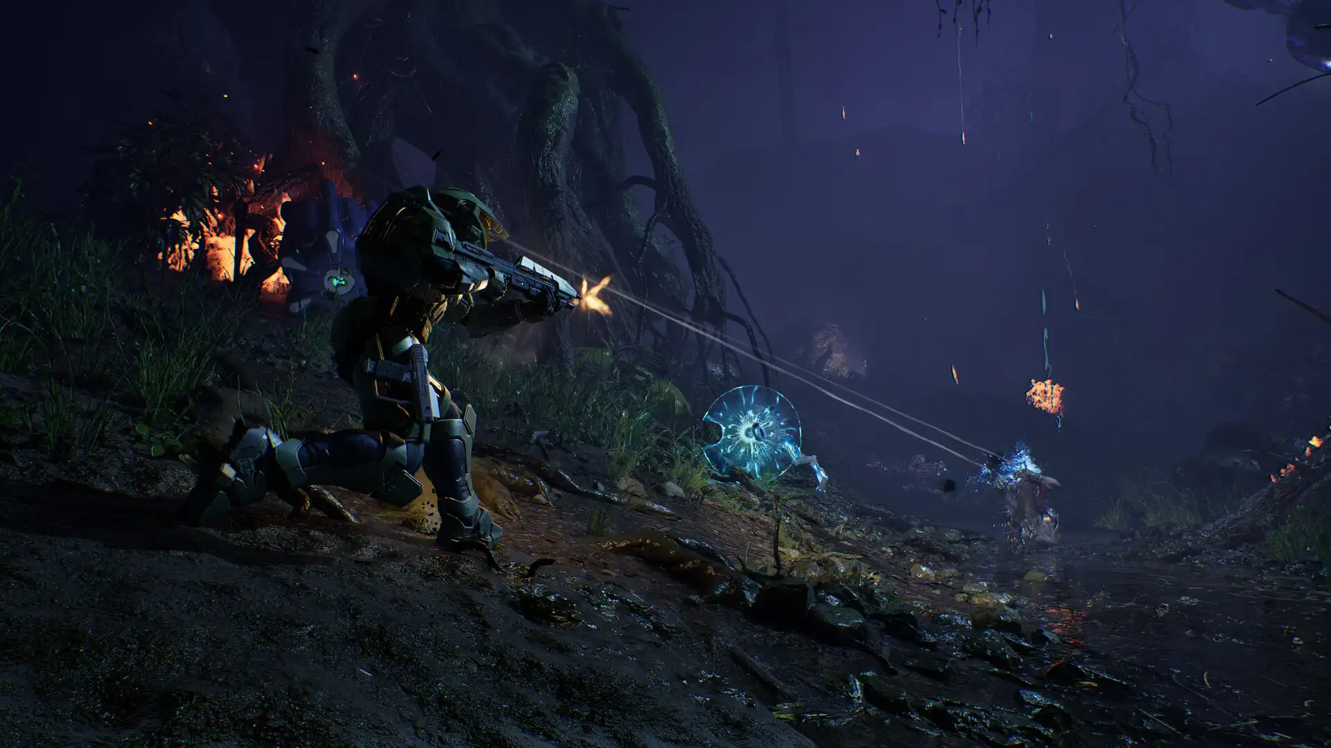El Jefe Maestro disparando al Covenant en un bosque oscuro