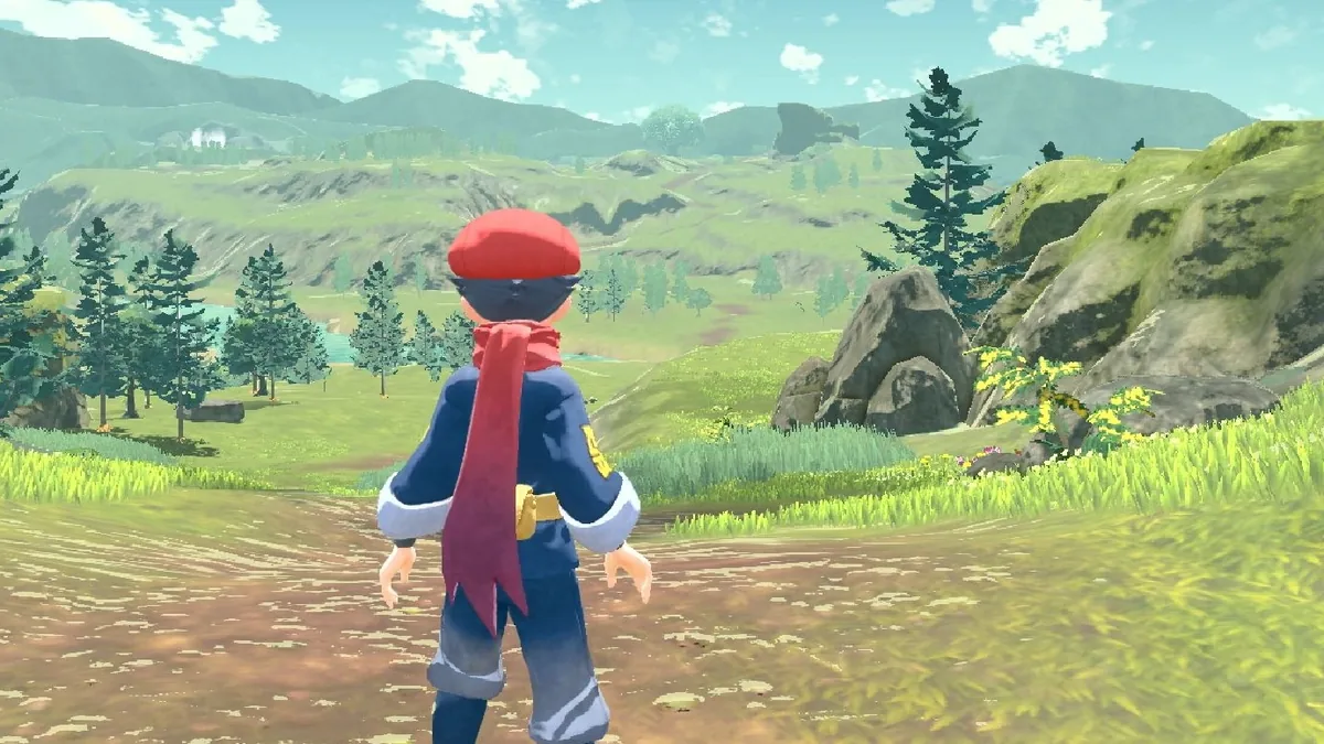 Protagonista del Cuerpo de Exploración contemplando el valle abierto de Hisui en Leyendas: Arceus